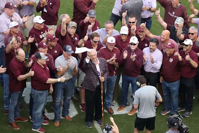 Nov. 18, 2023; College Station: Former Texas A&M coach Jackie Sherrill stands on Kyle Field to be honored alongside former players during the first half of the Aggies' home matchup against Abilene Christian